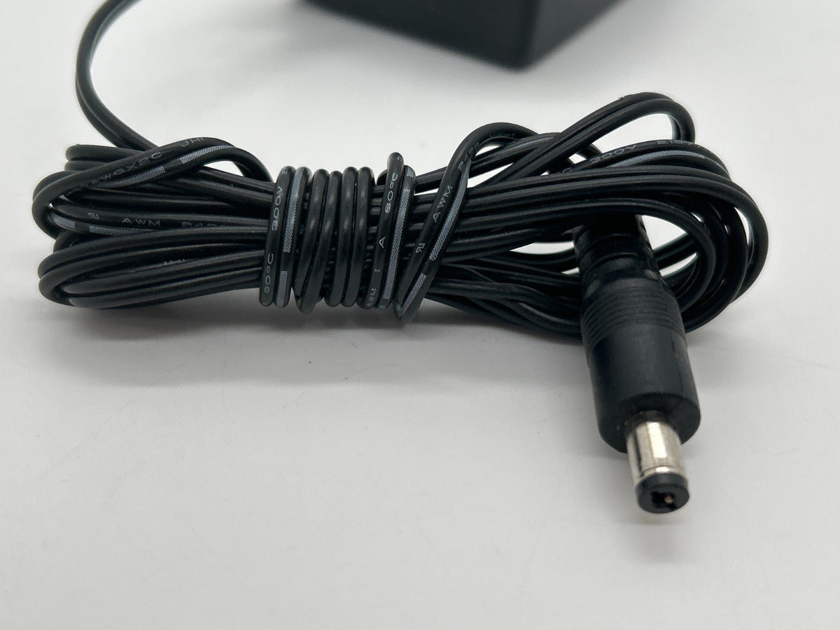 Actiontec CDS024T-W120U - 12V/2A - AC Power Adapter - Center Positive - Used
